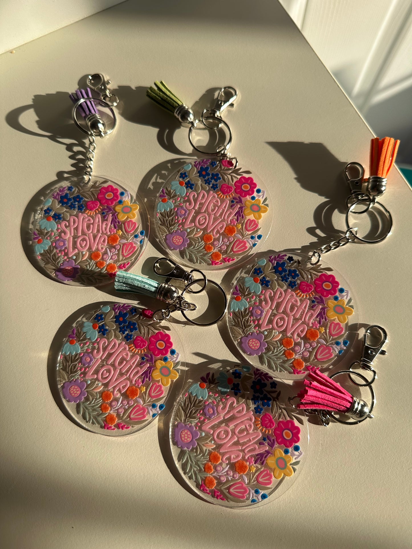 Spread love acrylic keychain