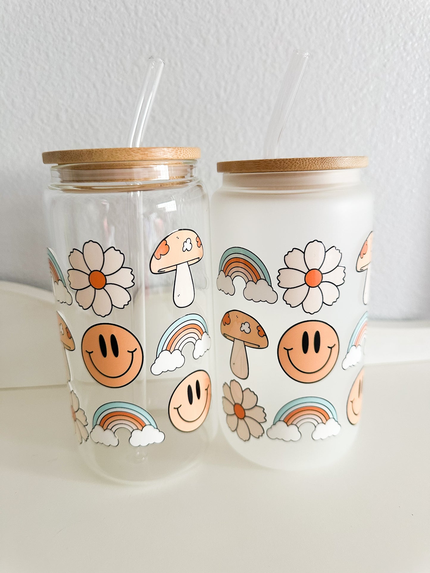 Rainbows and smiley faces glass cup