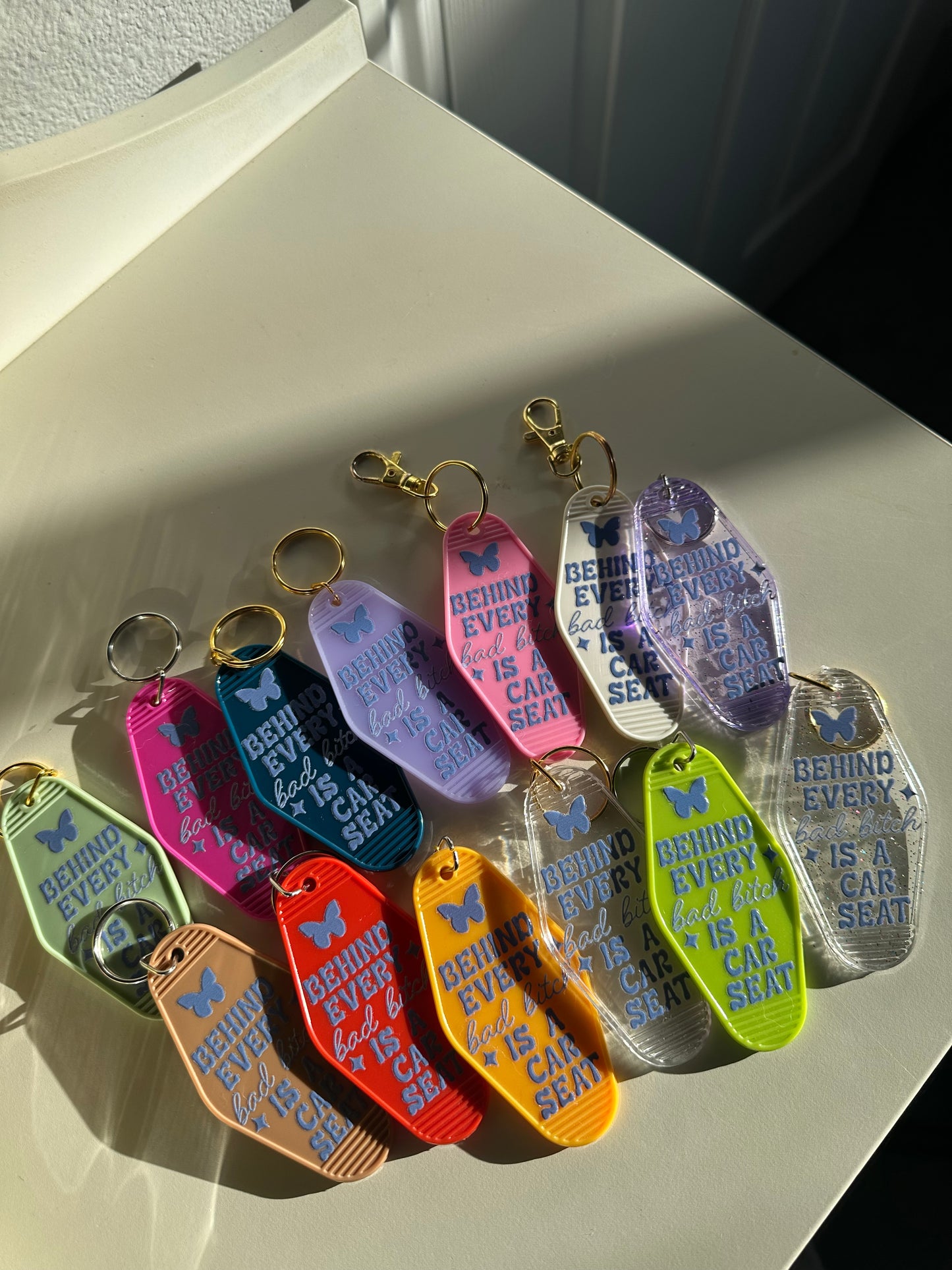 Behind every bad b Is a car seat motel Keychain