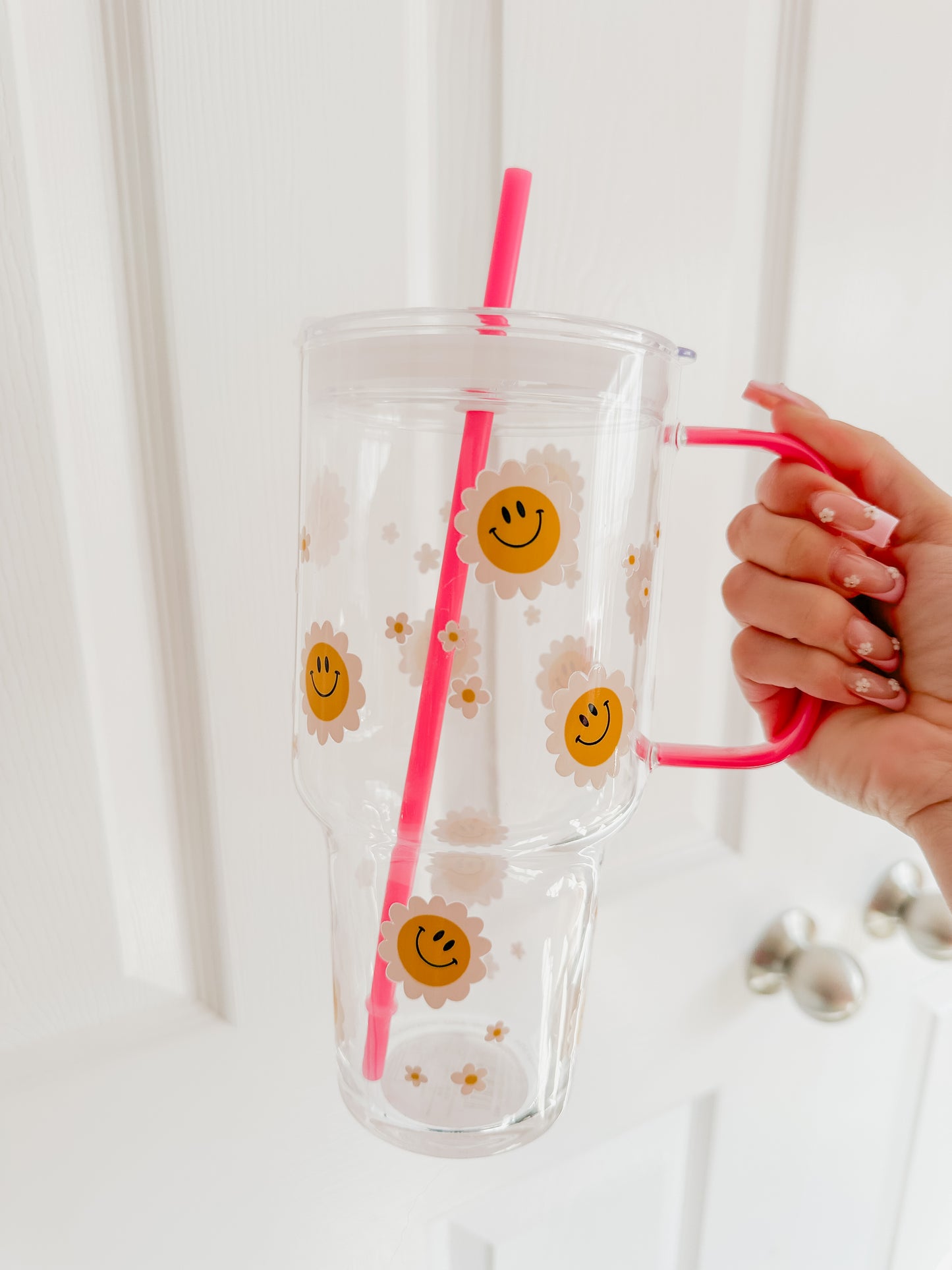 Floral smiley glass tumbler mug
