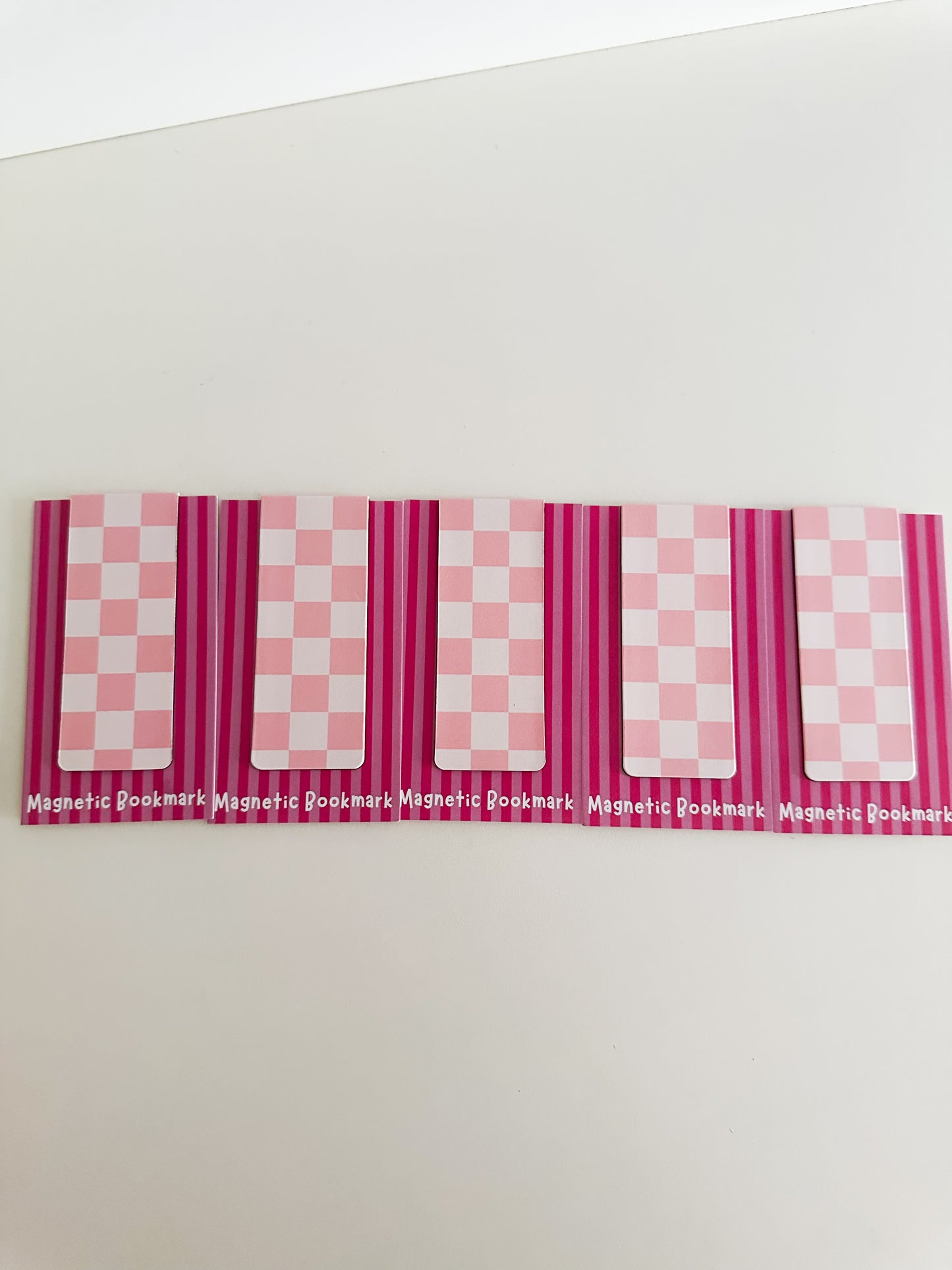 Pink checkered magnetic bookmark