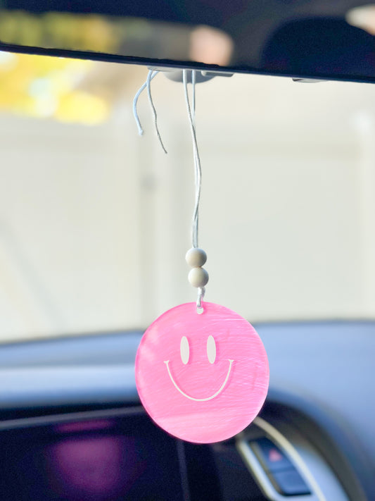 Pink smiley face car hanger