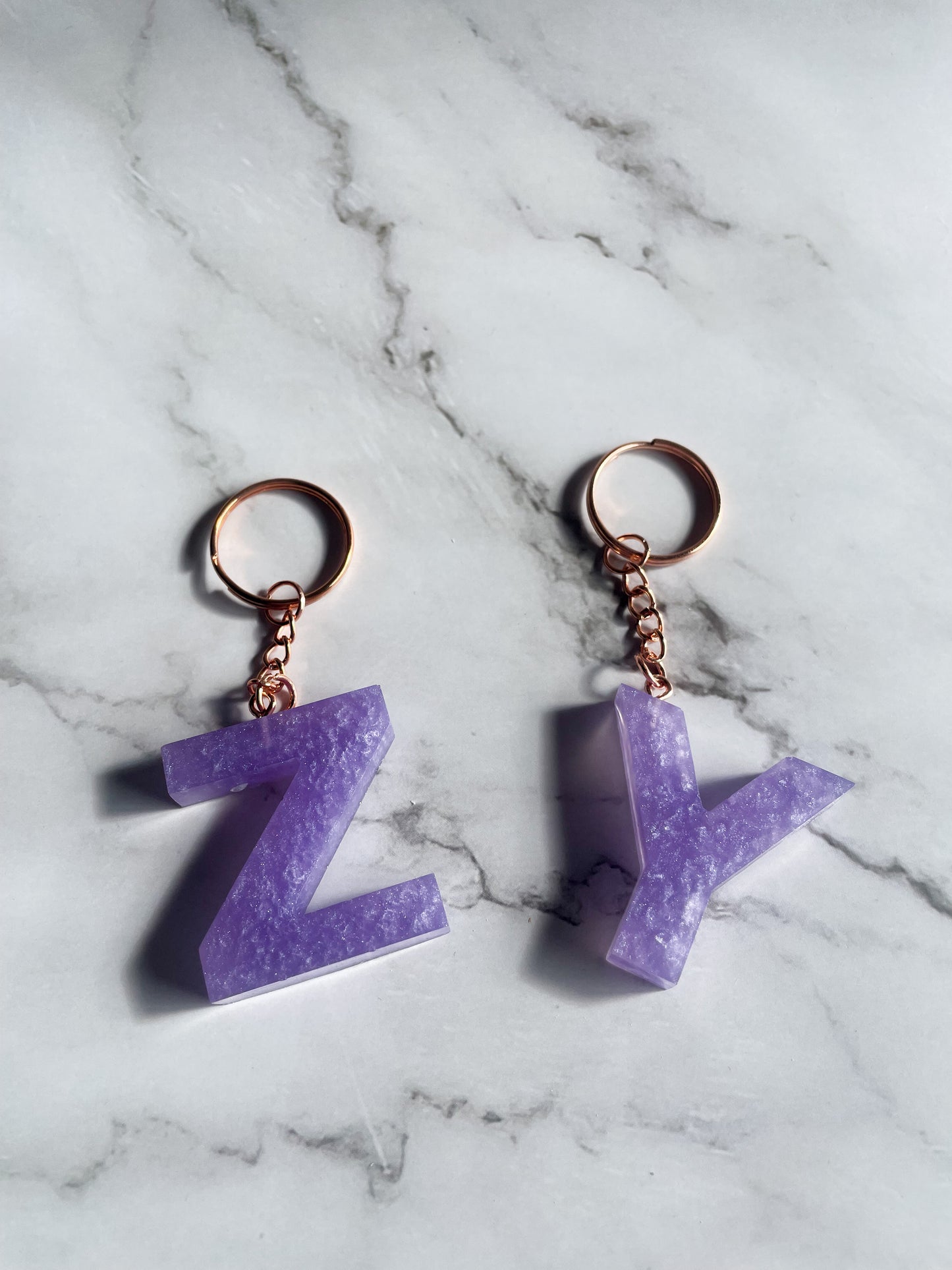 Purple initial rose gold keychain