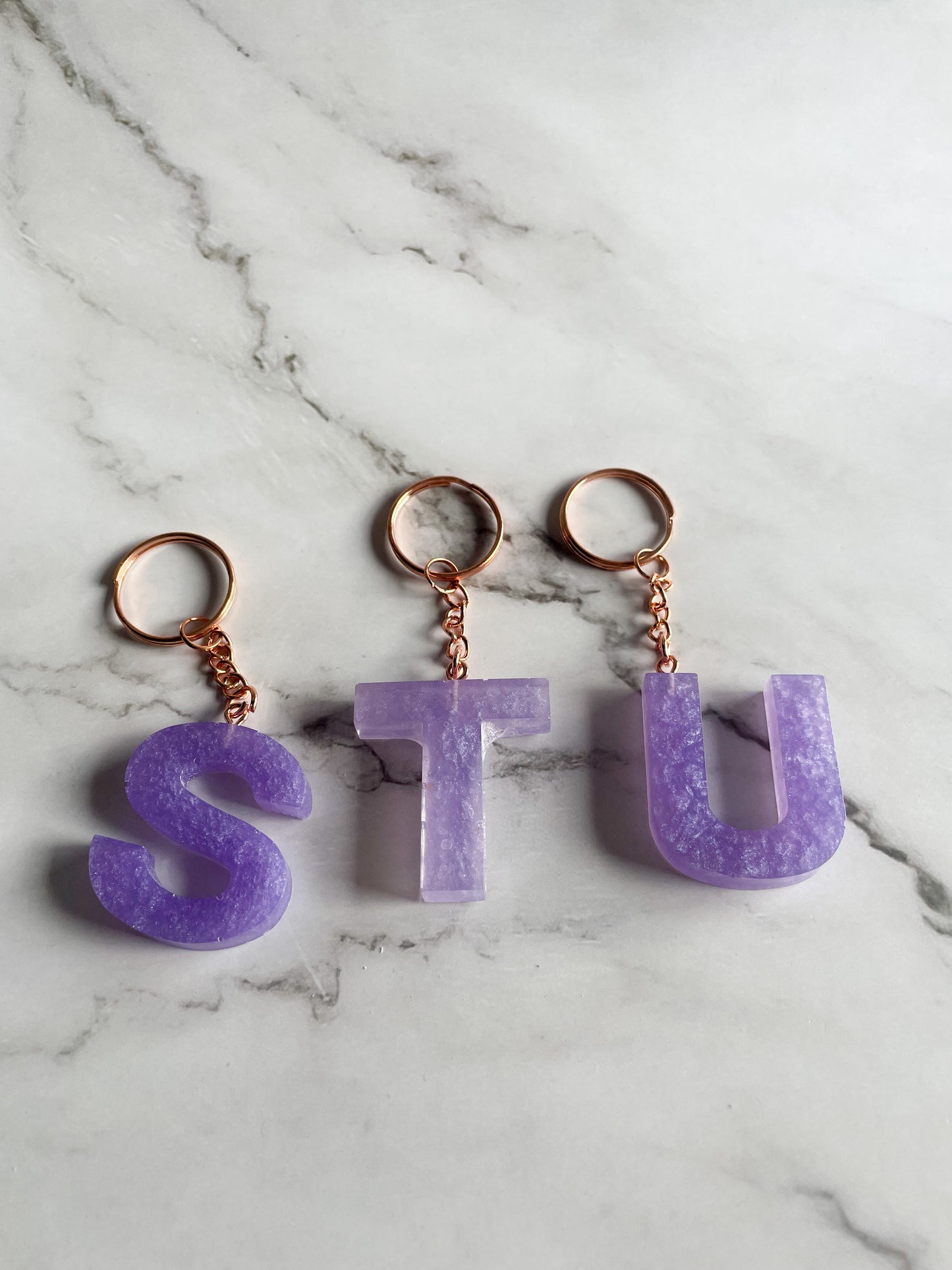 Purple initial rose gold keychain