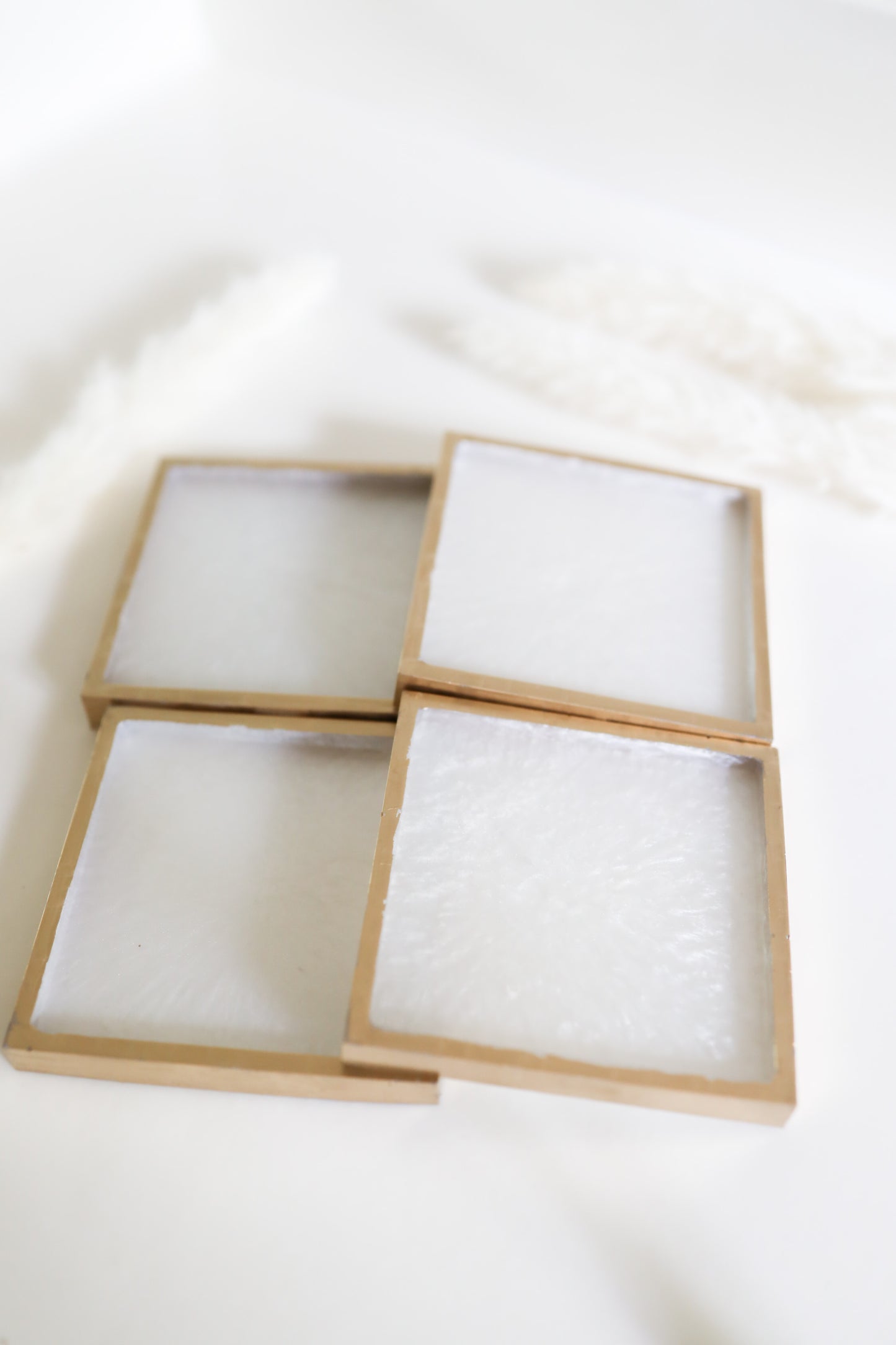 White w/gold lining squared coasters
