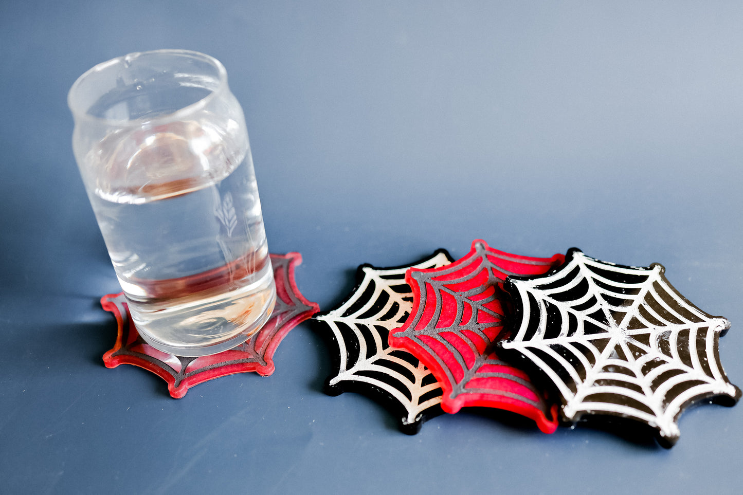 Spider web coasters