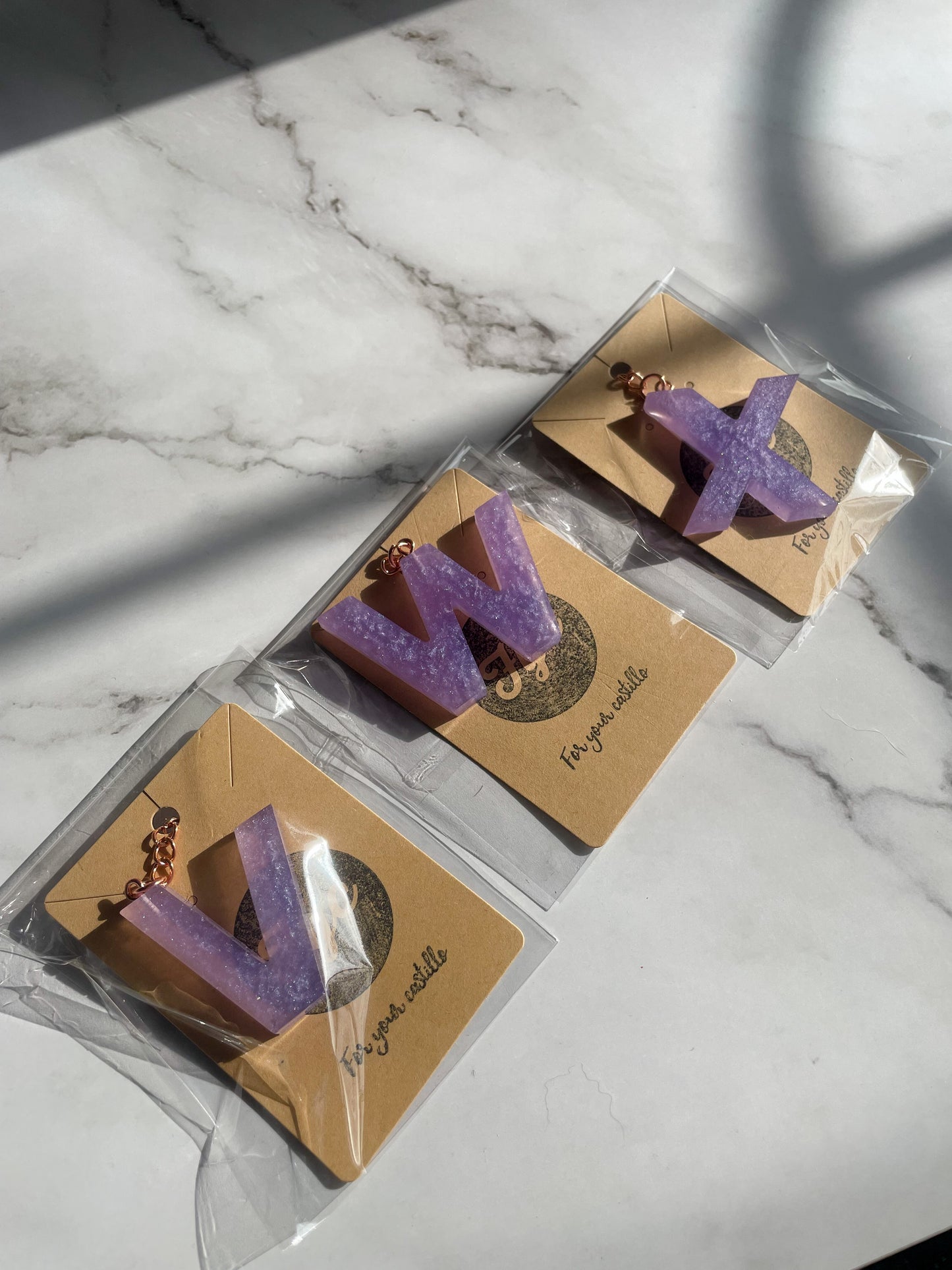 Purple initial rose gold keychain