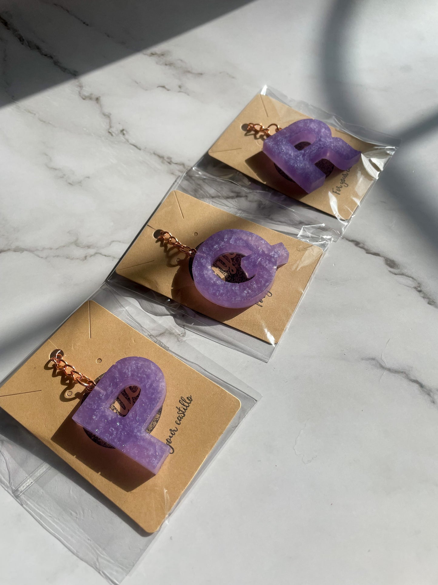 Purple initial rose gold keychain