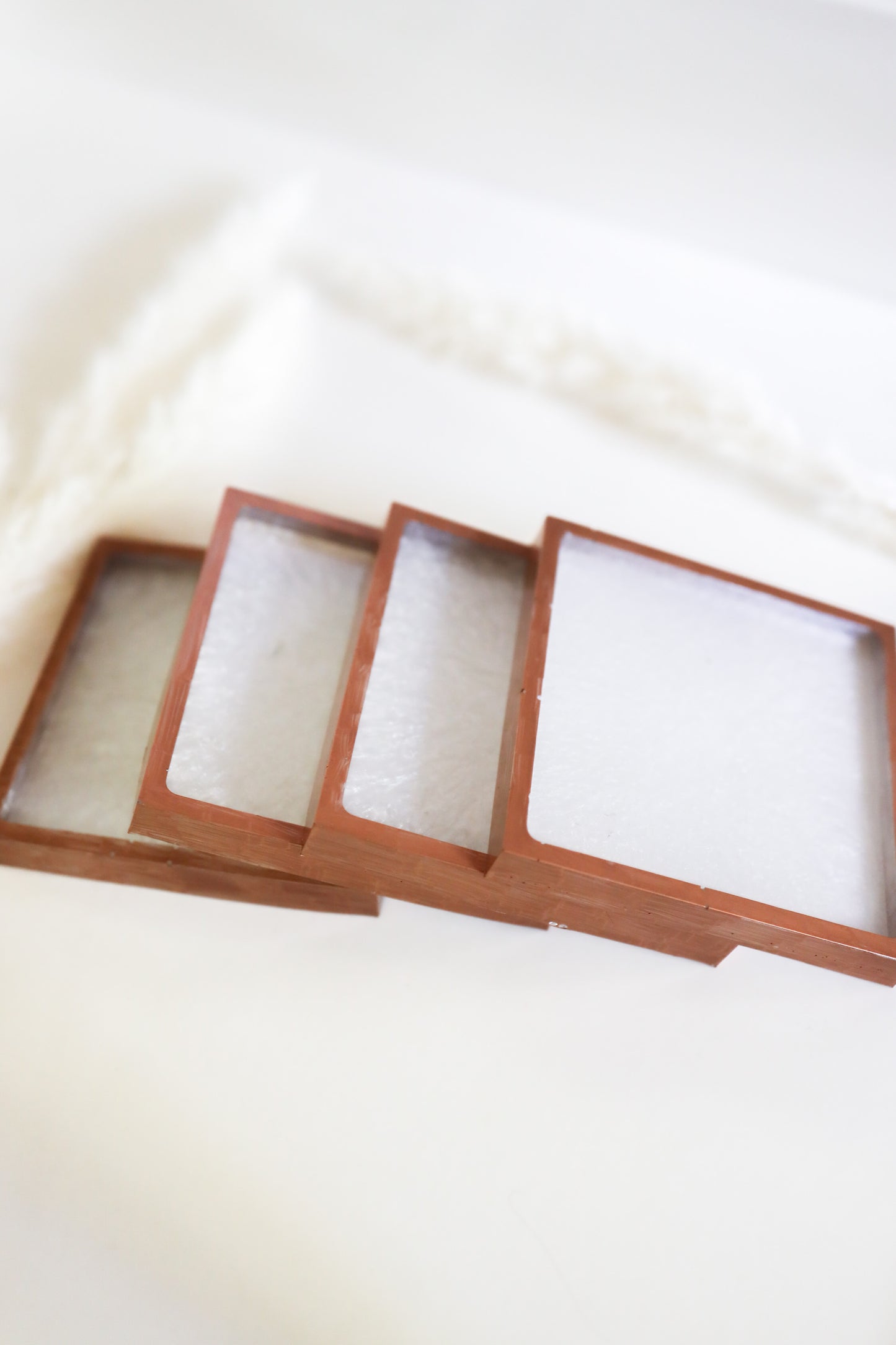 White w/rose gold lining squared coasters