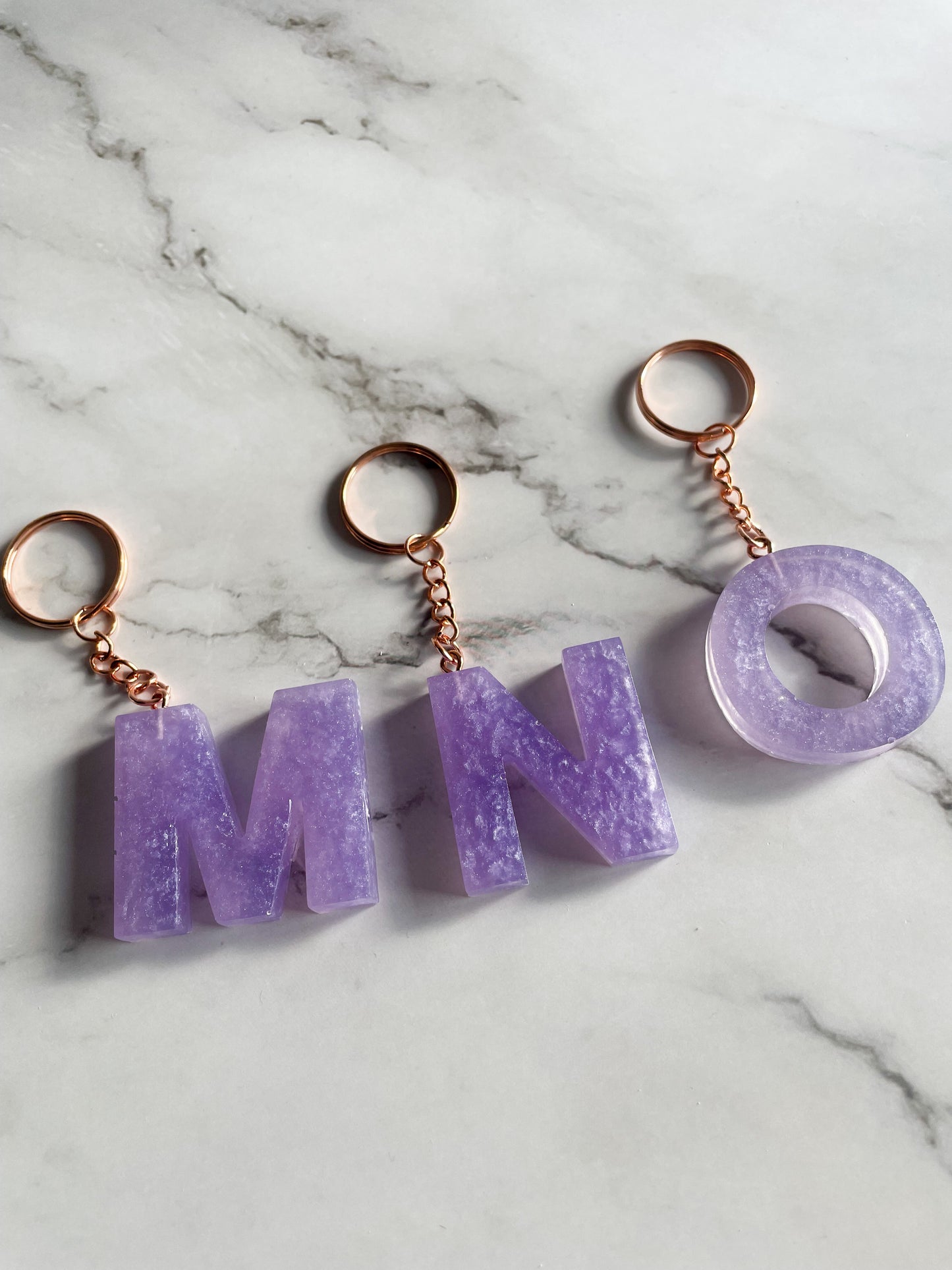 Purple initial rose gold keychain