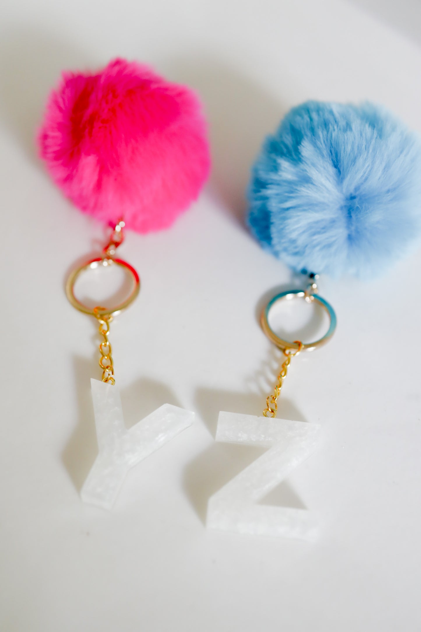 White initial Gold keychain w/pom