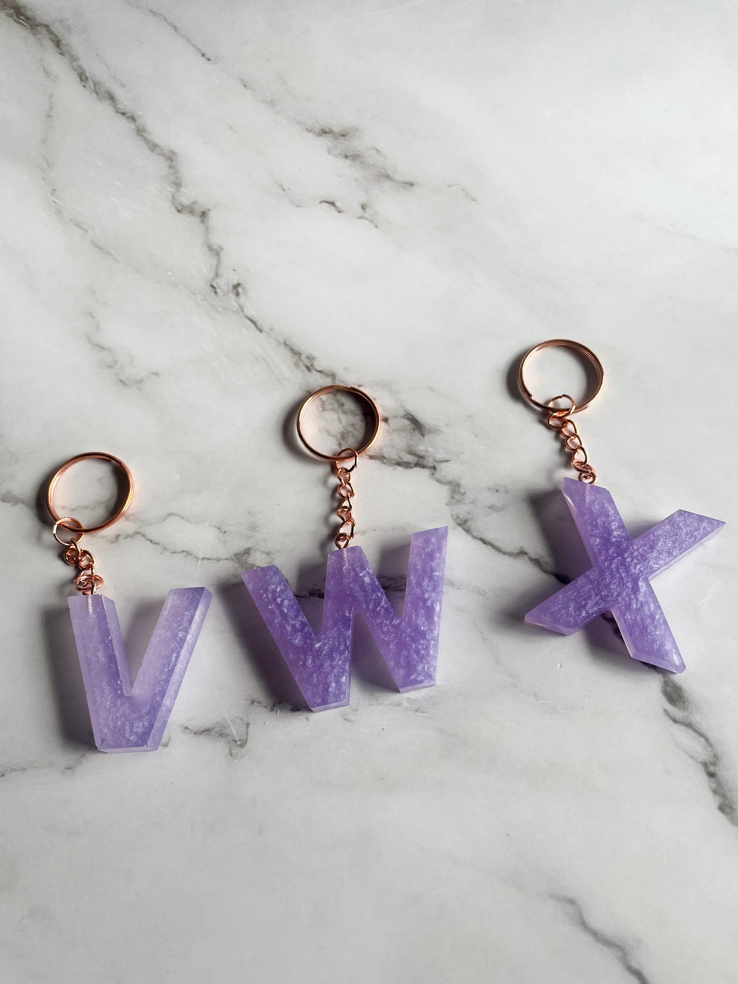 Purple initial rose gold keychain