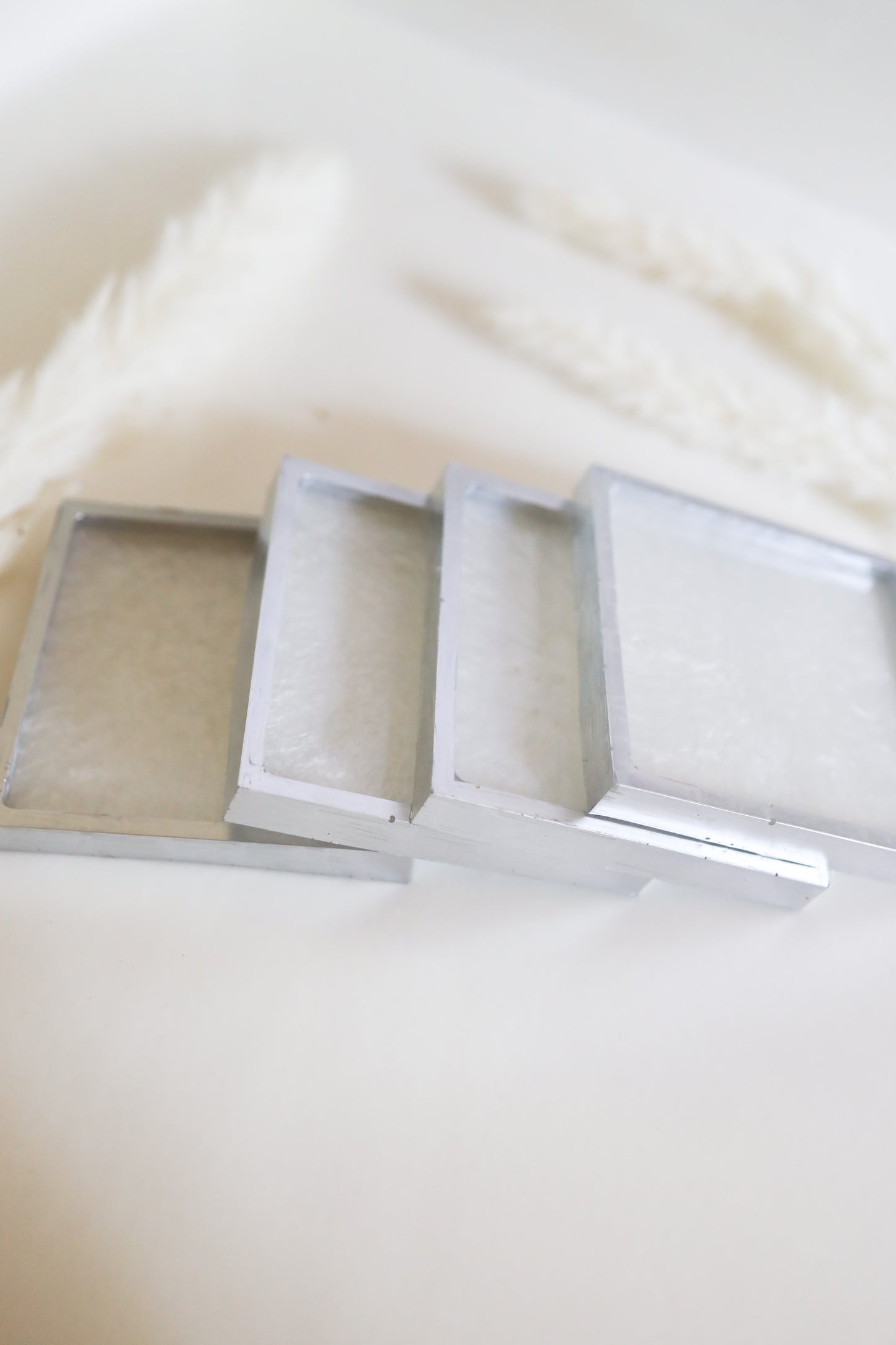 White w/silver lining squared coasters