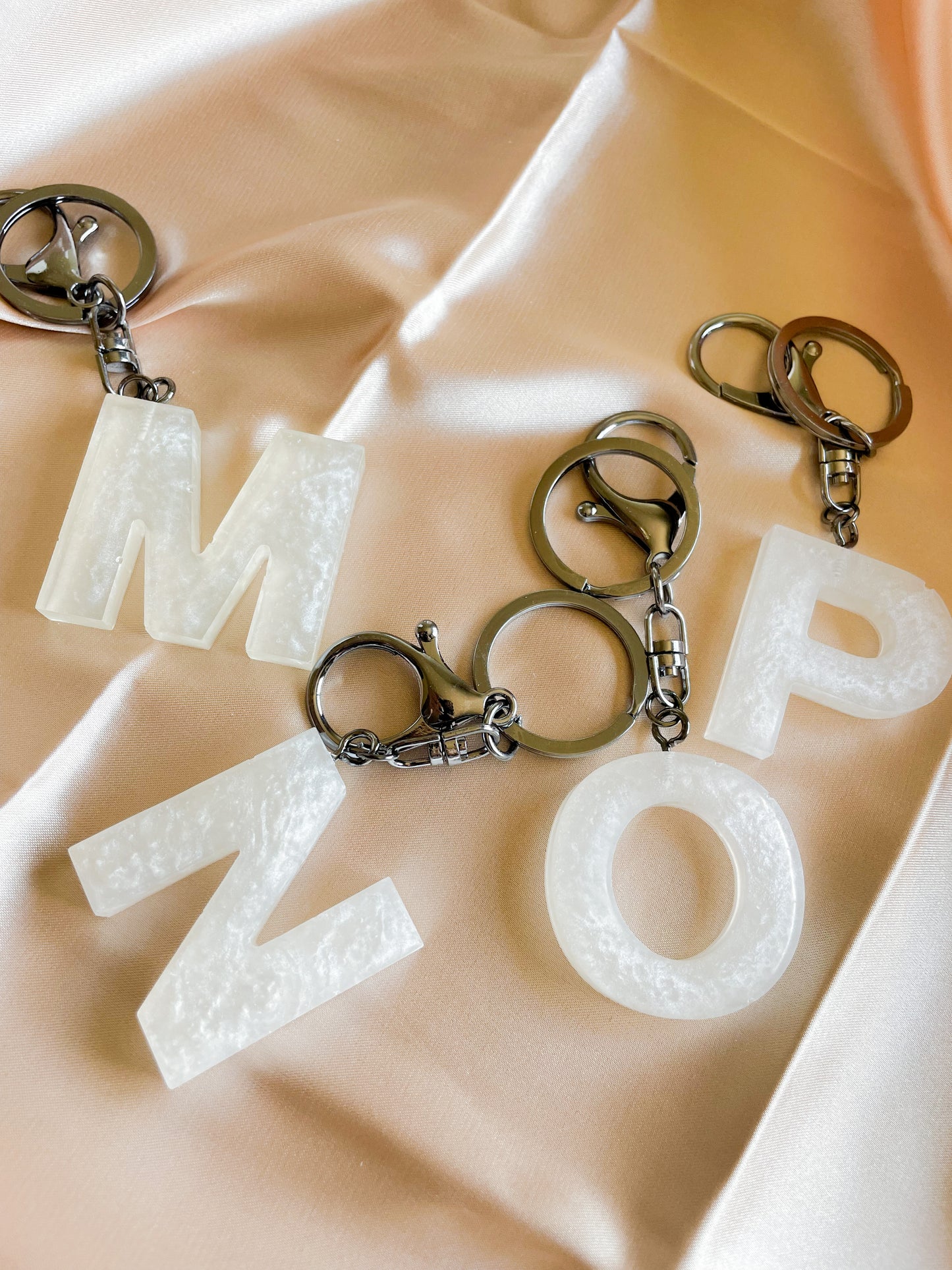 White initial keychain *Black keychain*