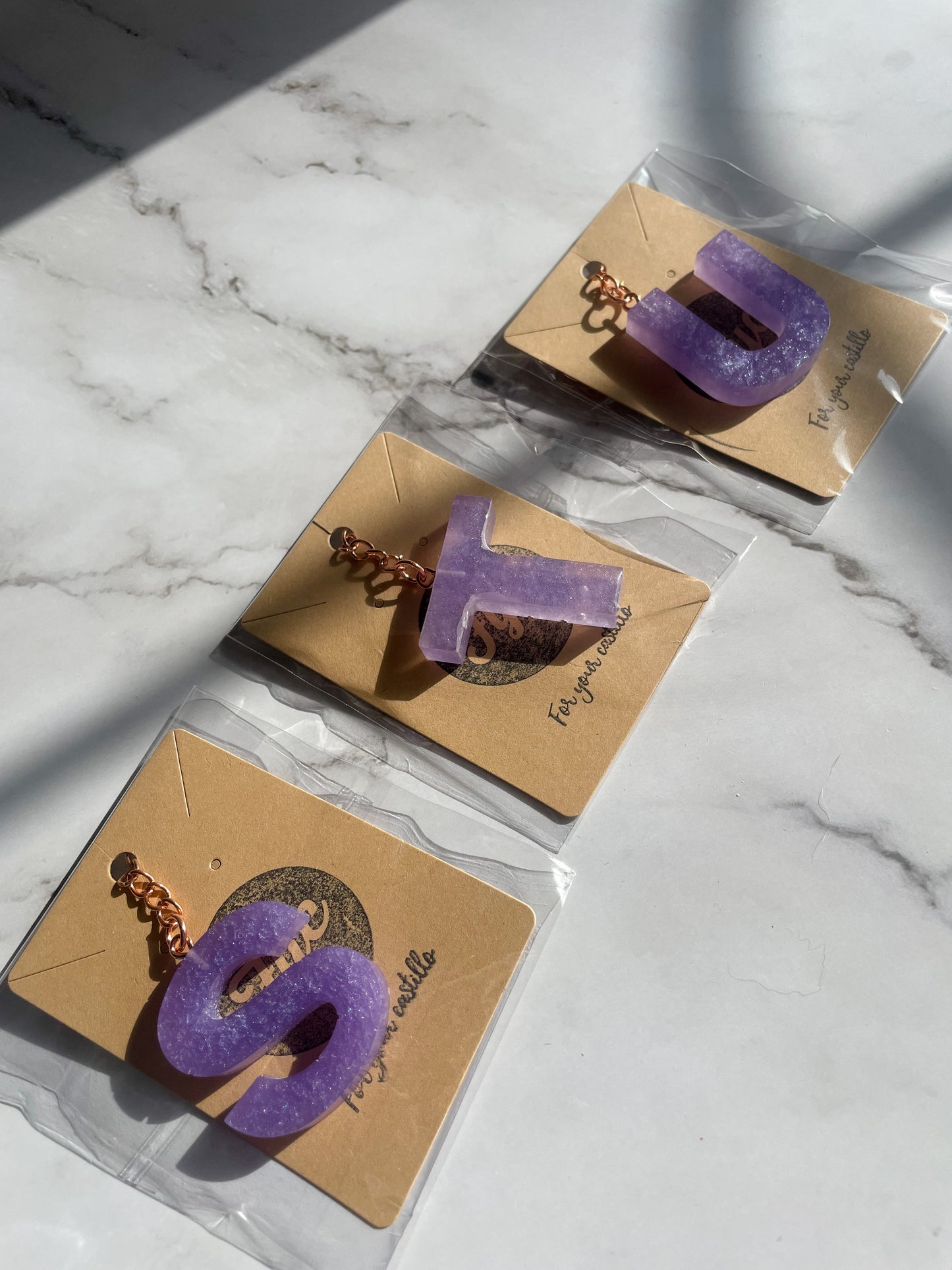 Purple initial rose gold keychain