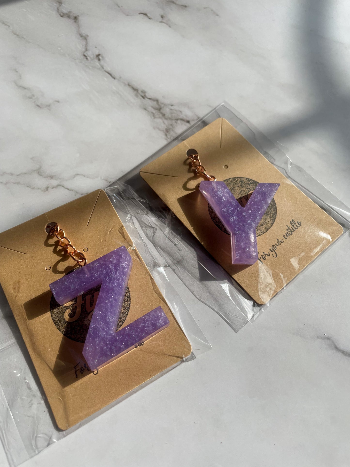 Purple initial rose gold keychain
