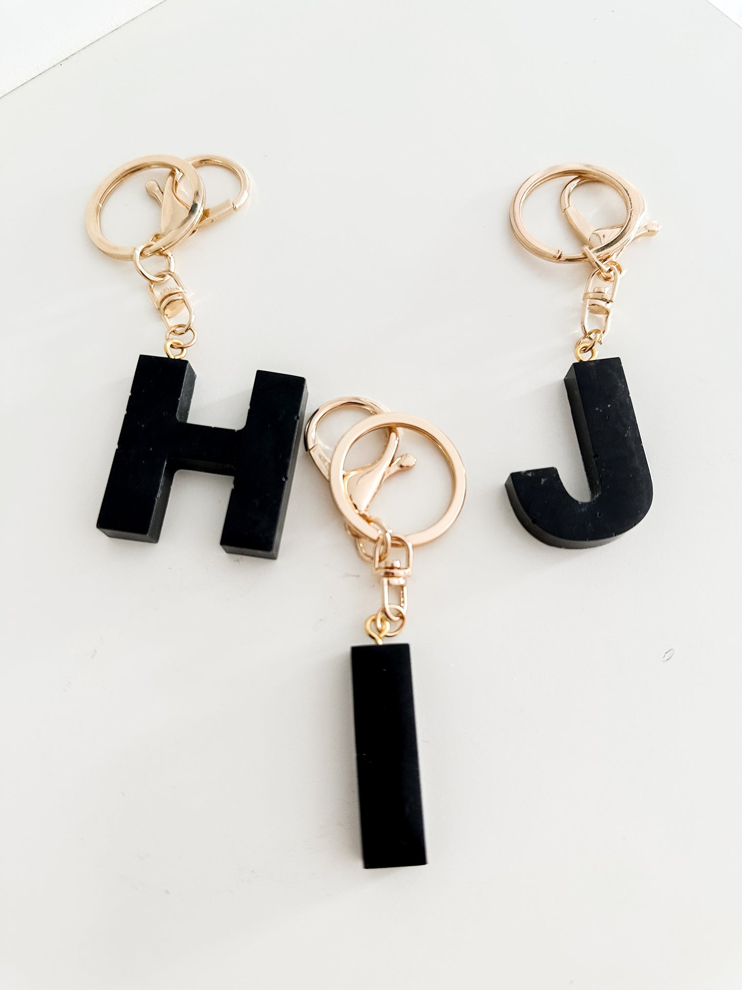 Black initial keychain *gold*