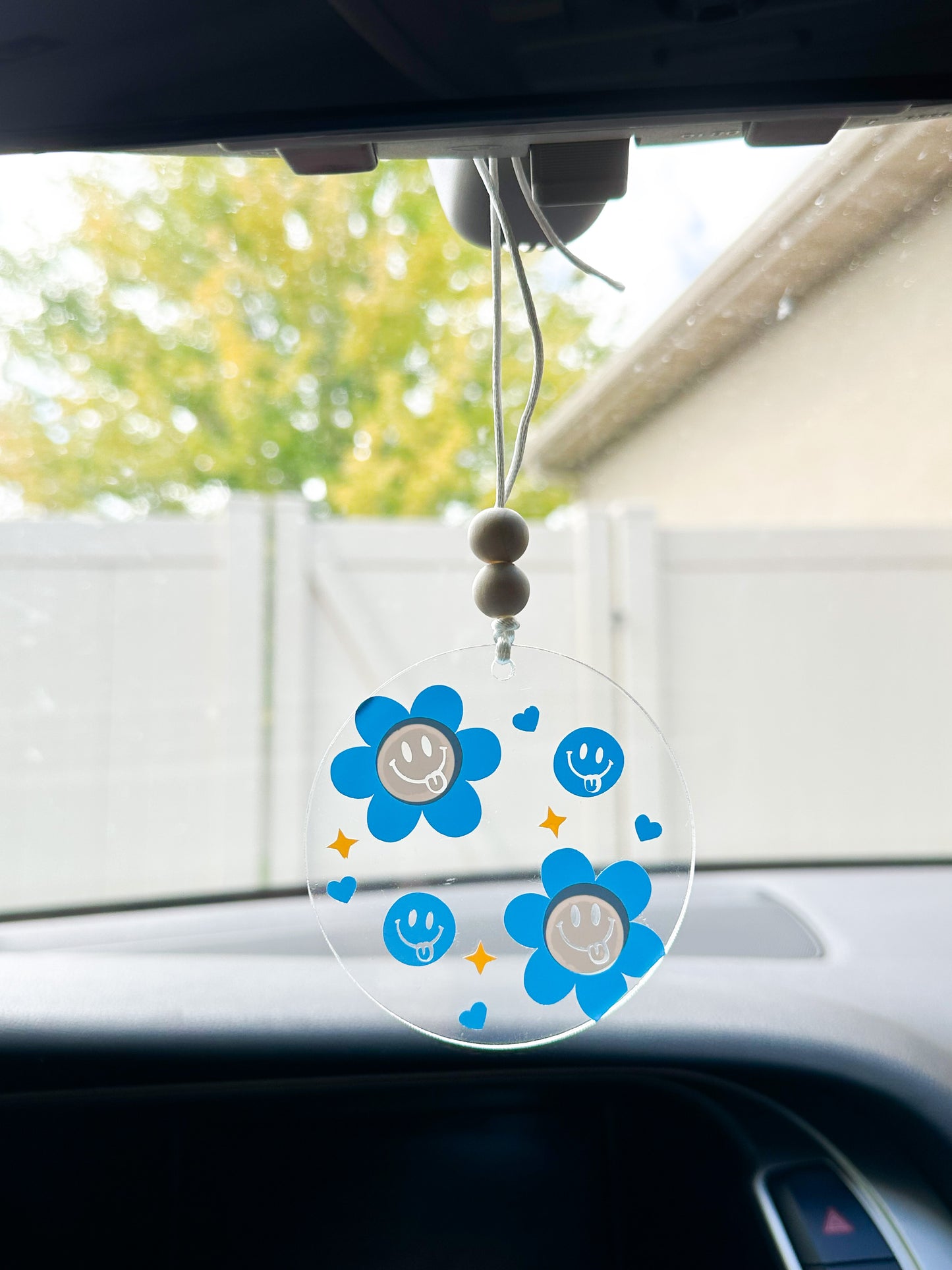 Blue smiley floral car hanger