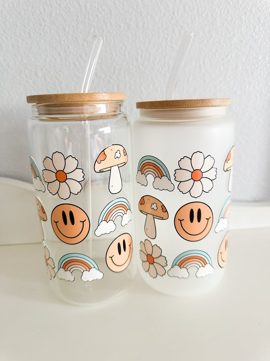 Rainbows and smiley faces glass cup