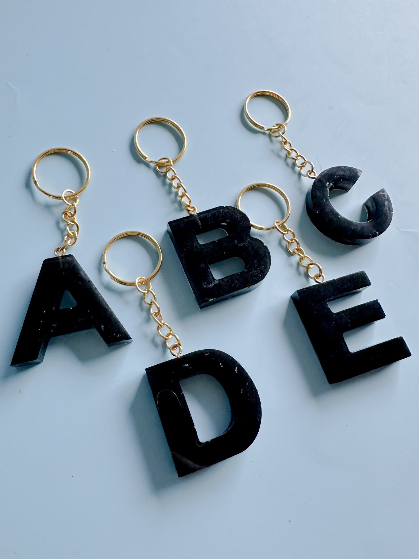 Black initial keychain *gold*