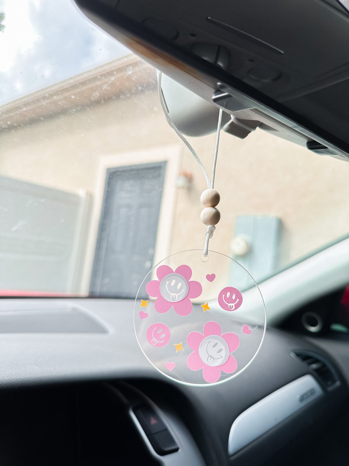 Purple smiley floral car hanger