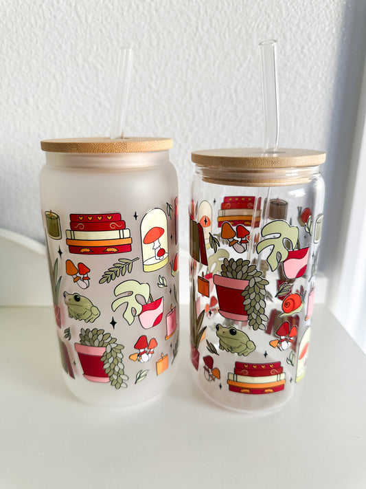 Plants frogs and books glass cup