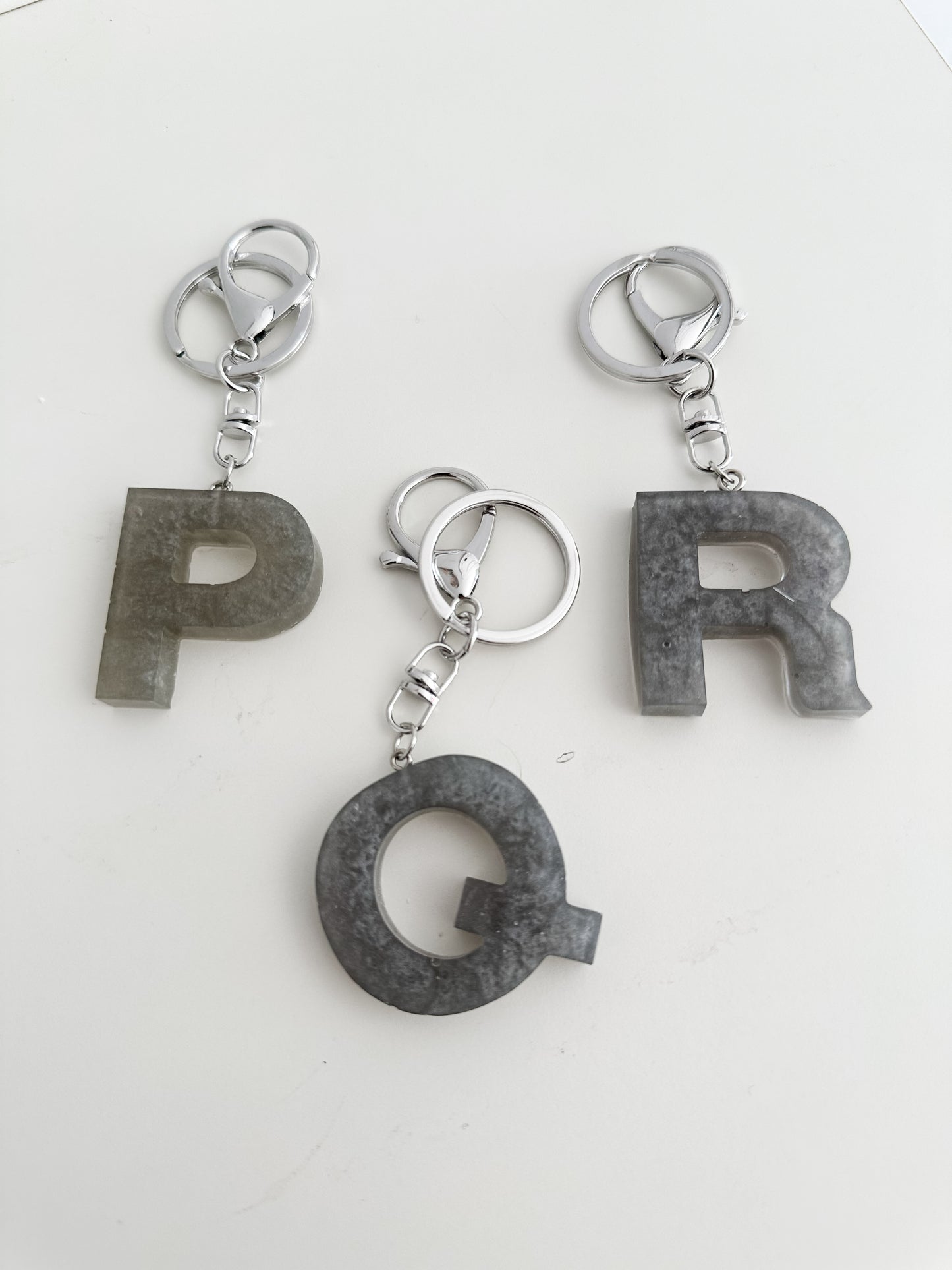 Grey initial keychain