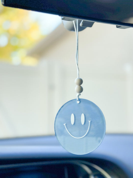 Blue smiley face car hanger