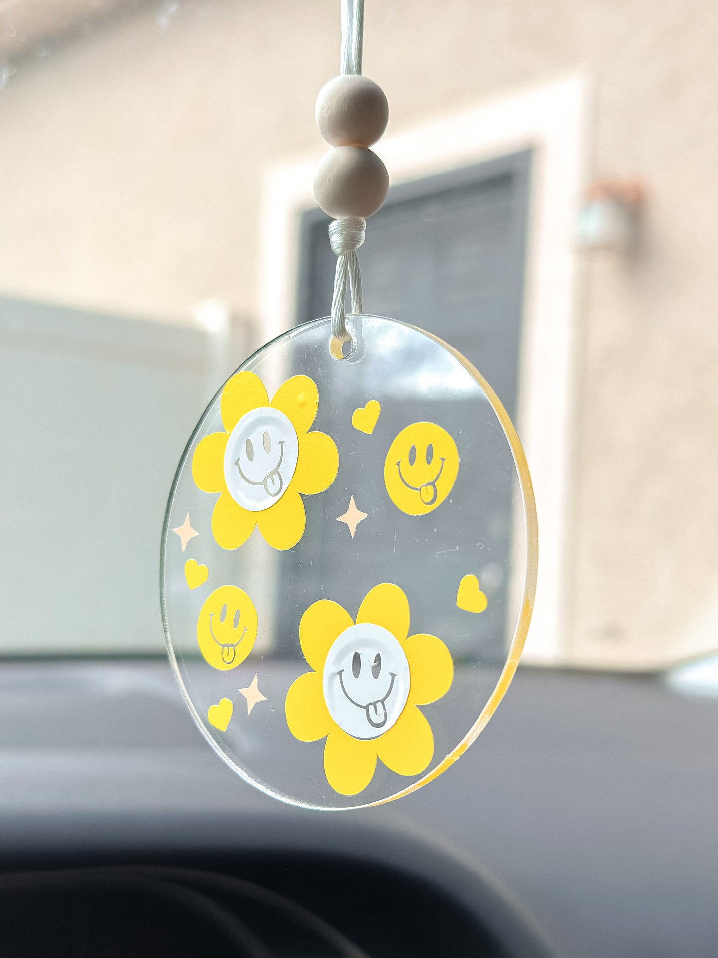 Yellow smiley floral car hanger