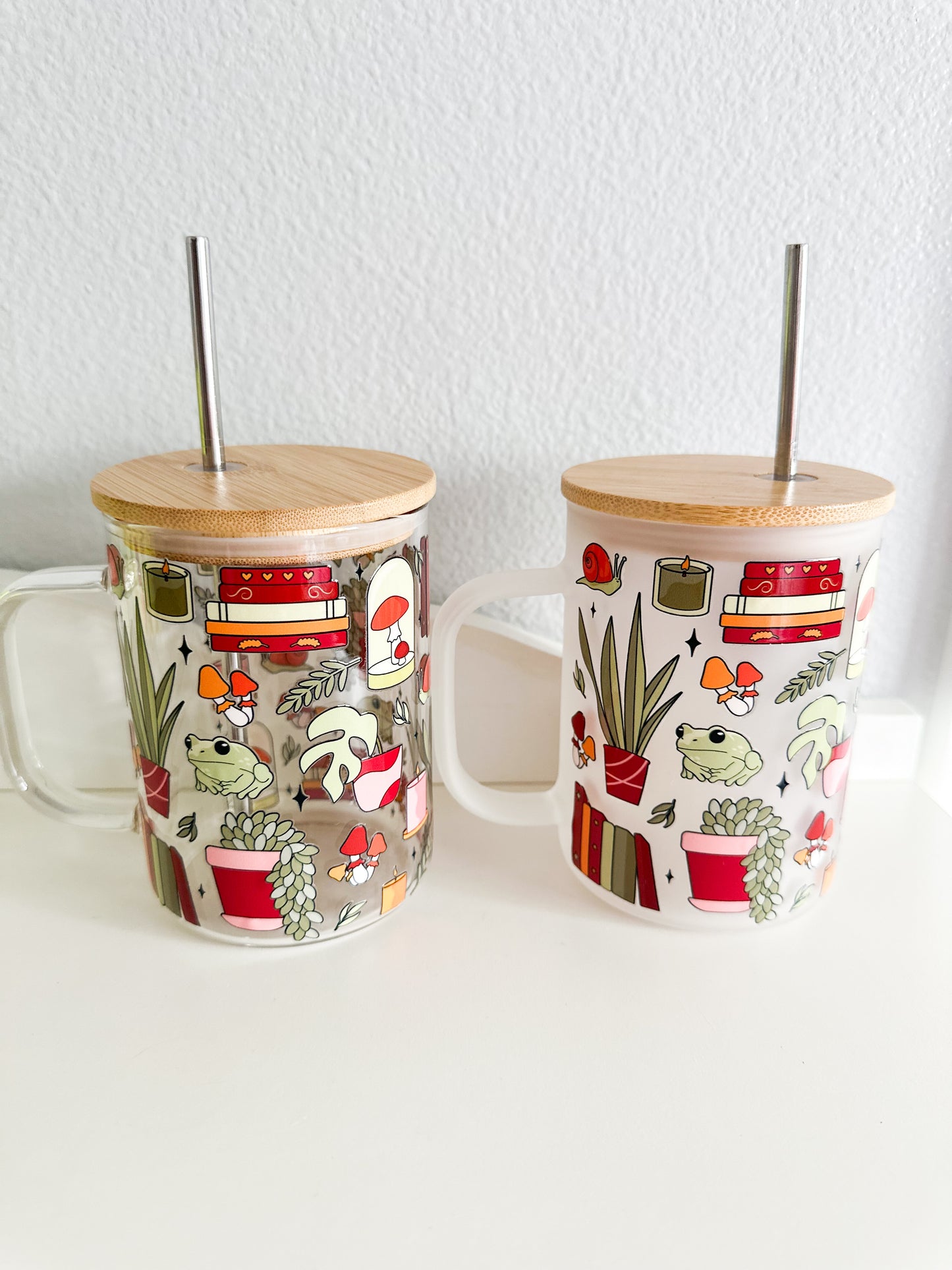 Plants frogs and books glass mug