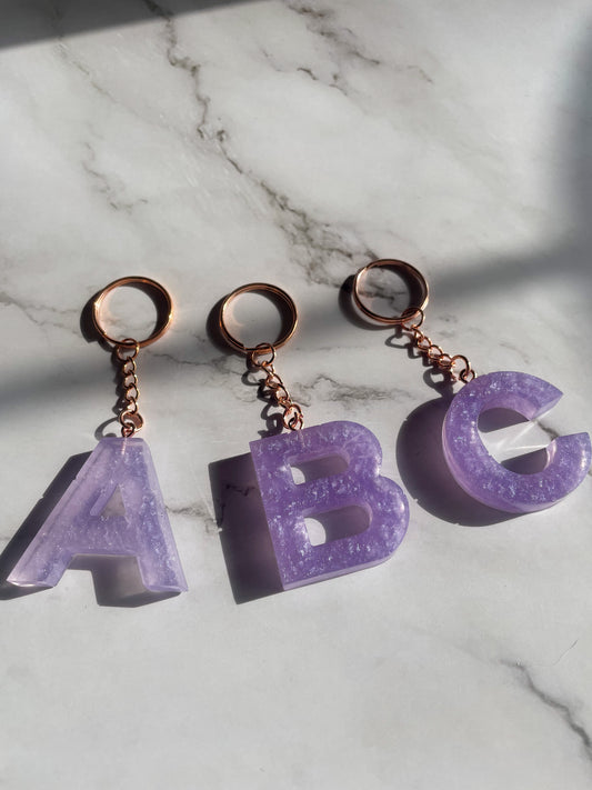 Purple initial rose gold keychain