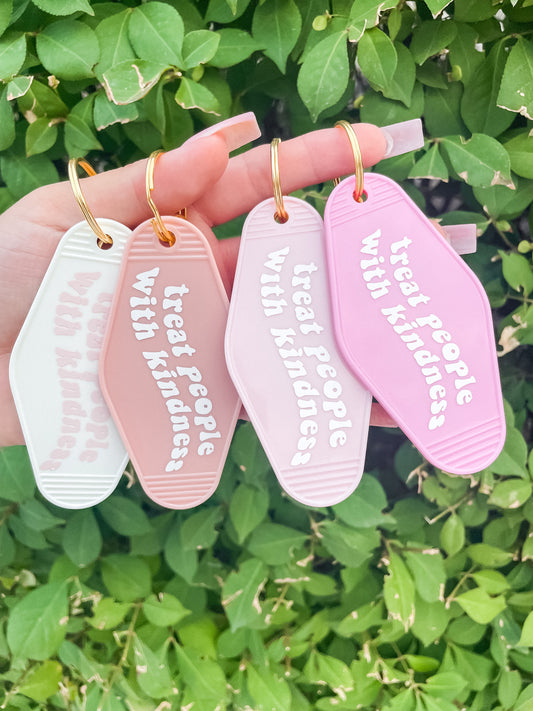 Treat people with kindness motel Keychain