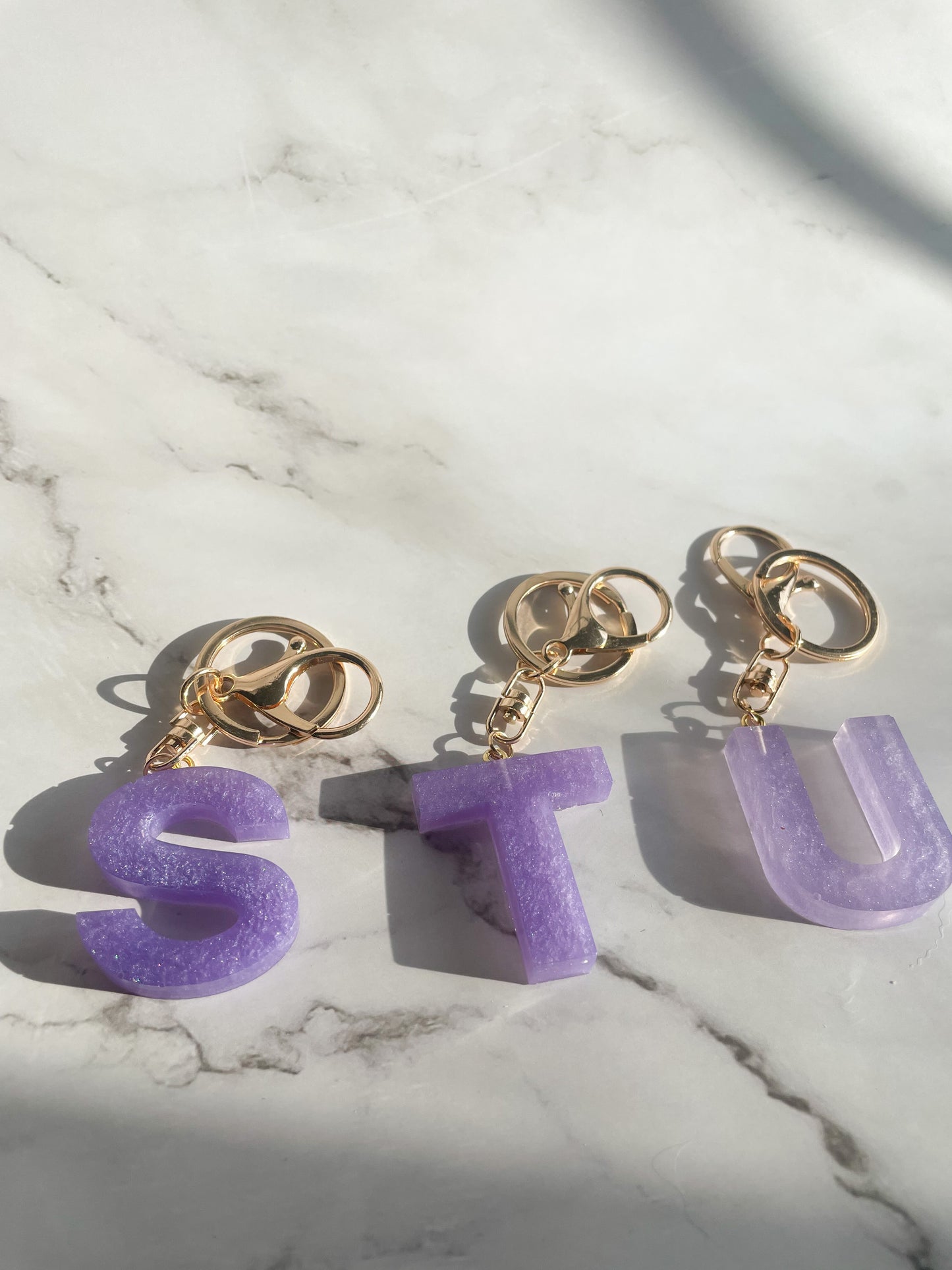 Purple initial w/gold lobster clip keychain