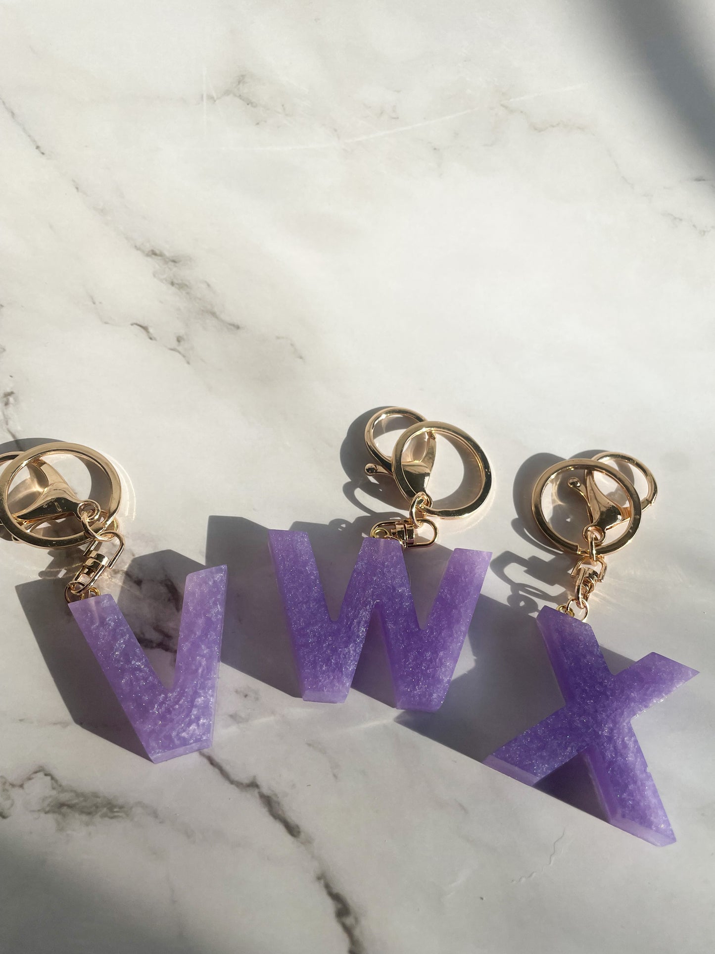 Purple initial w/gold lobster clip keychain