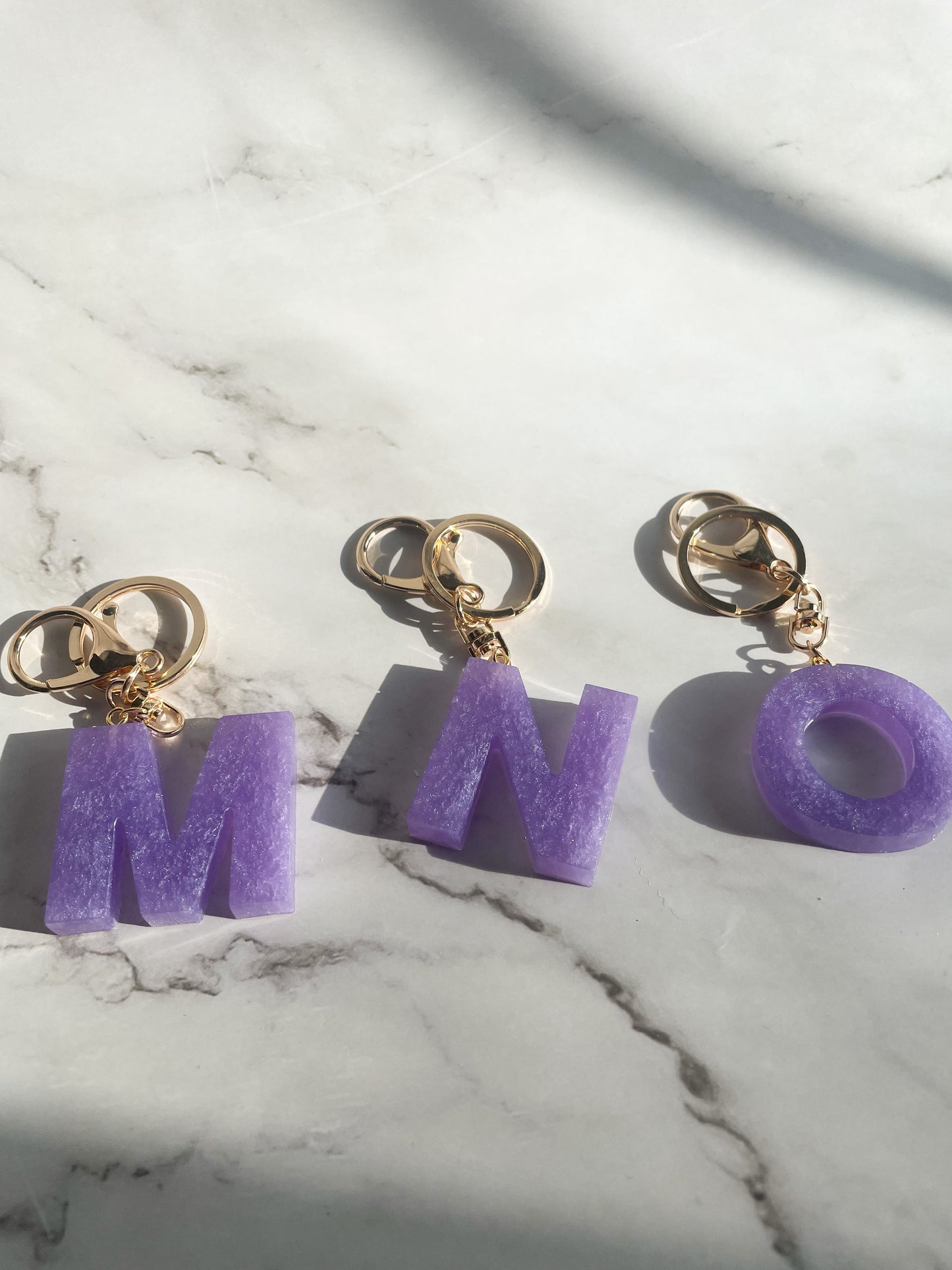 Purple initial w/gold lobster clip keychain